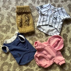 4 XS dog shirts - rarely worn, if ever - selling as a set!